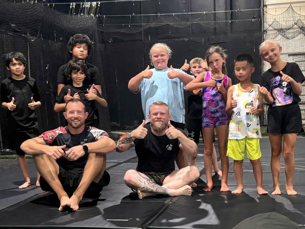 Memento Mori MMA kids class with coaches and students